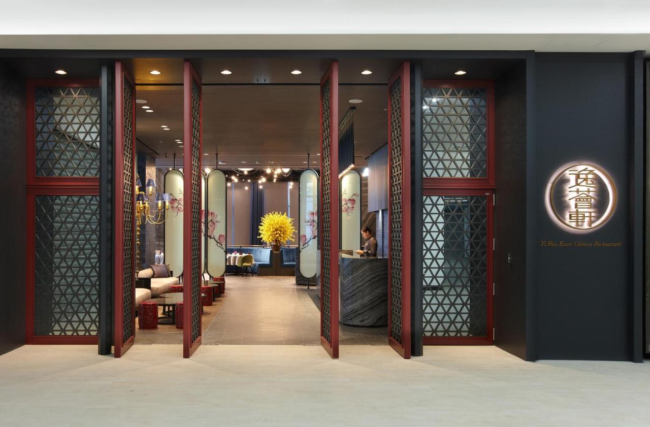 Hotel Cozzi Blu Zhongli Exterior foto The entrance of the restaurant